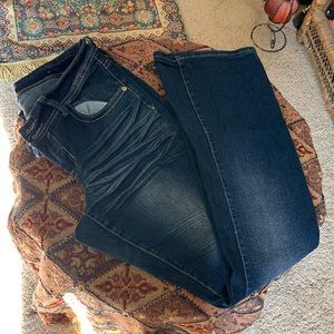 South Pole jeans with zipper back pockets and studs.  Must have plus size